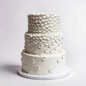 CASCADING WHITE TINY FONDANT FLOWERS 3 TIER TALL