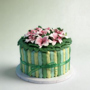 GREEN STRIPE CAKE W PINK FLOWERS