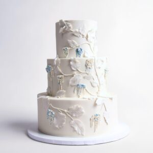 SUGAR FLOWER WHITE LEAVES WITH TOUCH OF LIGHT BLUE 3 TIER TALL