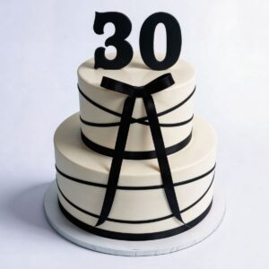 WHITE CAKE BLACK RIBBON