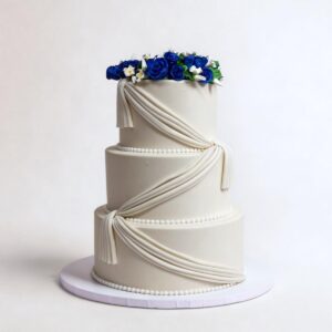 WHITE DRAPES PUPLE FLOWERS 3 TIER TALL