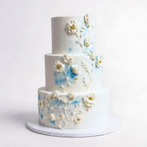 WHITE FANCY FLOWERS WITH LIGHT BLUE & GOLD DECO 3 TIER TALL